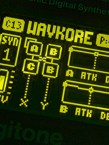 Yellow envelope LCD screen of Digitone FM synth